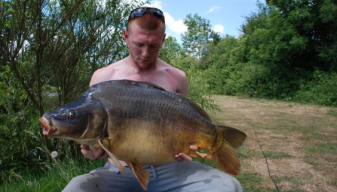 A 33 lb 11 oz carp from Villefond, May 2011