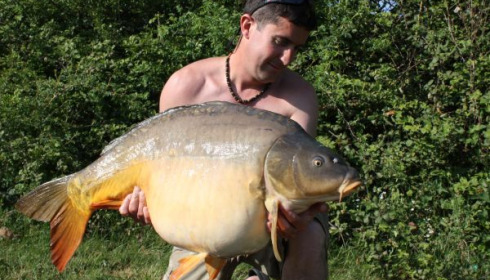 A 44 lb 6 oz carp from Villefond, Apr 2011