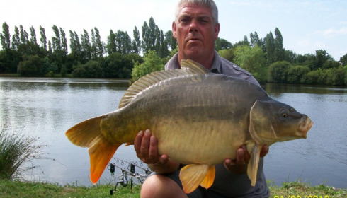 A 32 lb carp from Villefond, Jul 2012