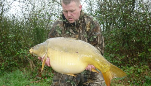 A 38 lb 6 oz carp from Villefond, Mar 2011