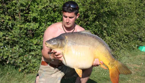 A 44 lb 6 oz carp from Villefond, Apr 2011