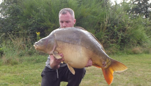 A 46 lb carp from Villefond, Bennets spawned out again, Jul 2012