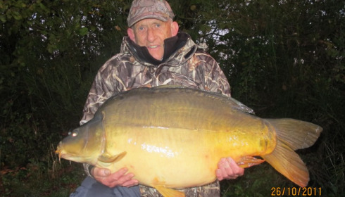 A 50 lb 10 oz carp from Villefond, John with Arnold the fish, Oct 2011