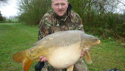 A 36 lb 6 oz carp from Villefond, Mar 2011
