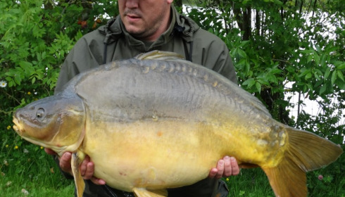 A 48 lb 8 oz carp from Villefond, measles, May 2016
