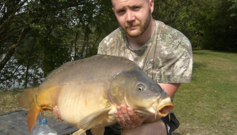 A 27 lb 8 oz carp from Villefond, Aug 2011
