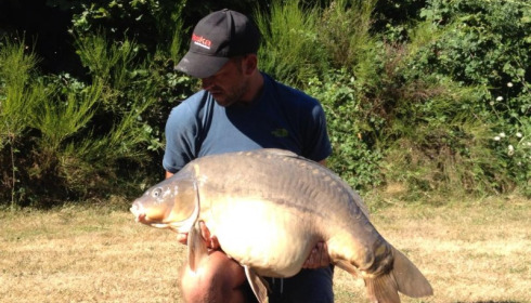 A 46 lb carp from Villefond, Heavily spawned out Slate Grey, Aug 2013