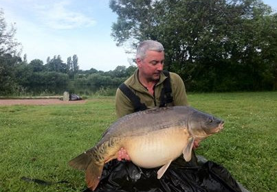 A 42 lb 4 oz carp from Villefond, Stephen Horrocks With Dorian the fish, Jun 2013